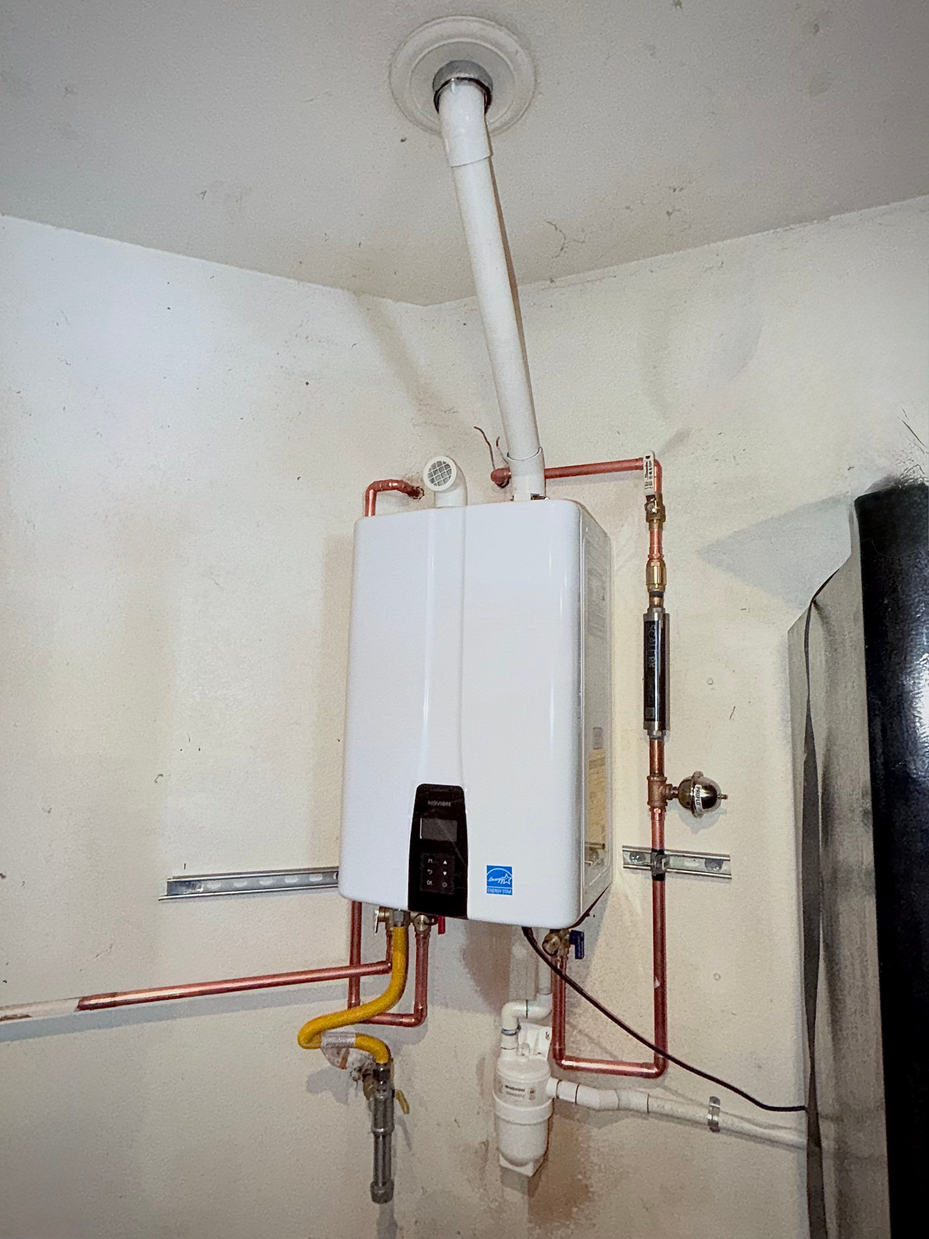 Project From Bulky Tank to On-Demand Hot Water With a Tankless Conversion image