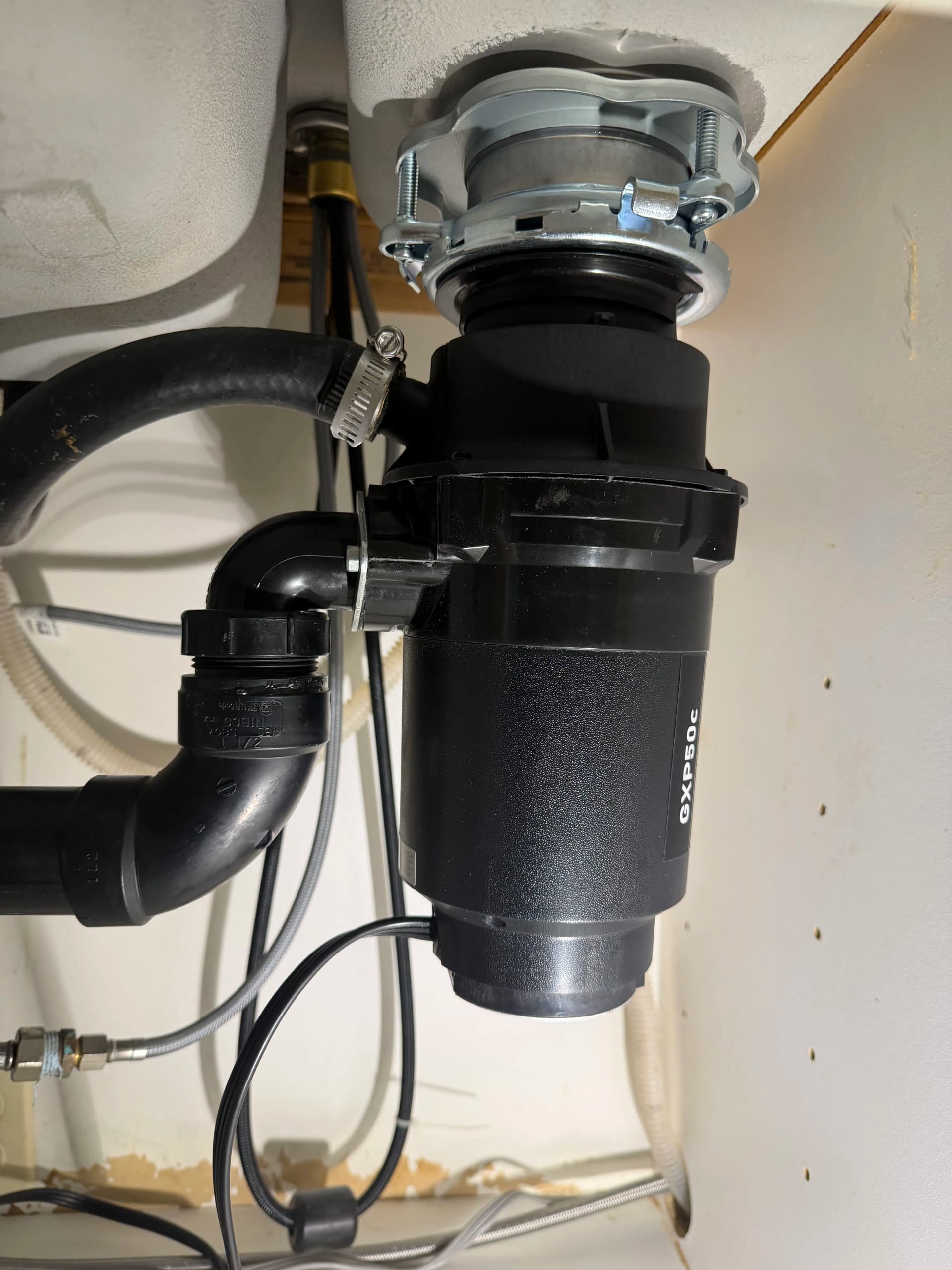 Rusty Garbage Disposal Found During Routine Maintenance image